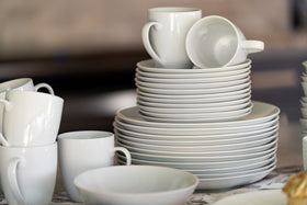 10 Strawberry Street plates in packaging, ready for restaurant or home use