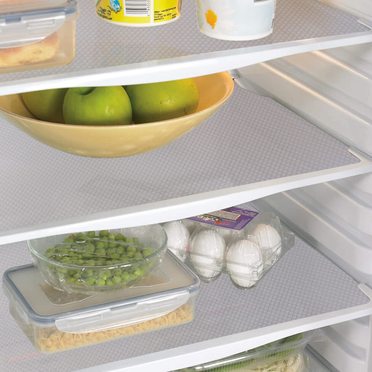 Aiosscd 7PCS fridge mats on a shelf providing cushioned protection for produce