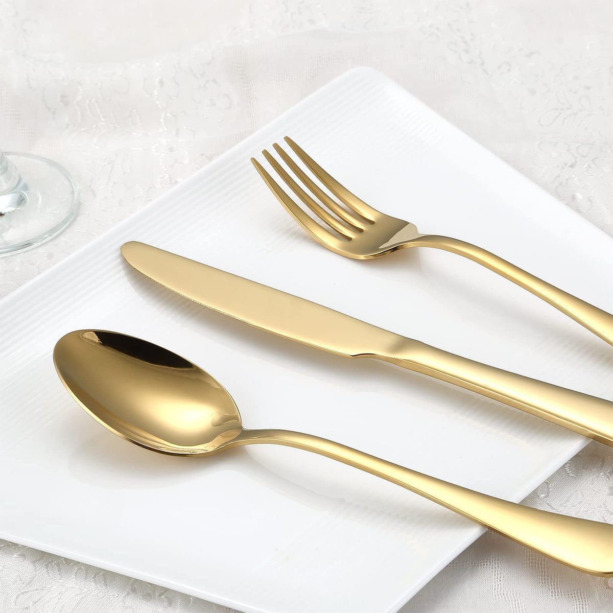 Aisoso gold flatware set 8 dinner forks highlighting durable stainless steel and gleaming surface.
