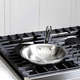 All-Clad D3 riveted handle provides balanced control during cooking