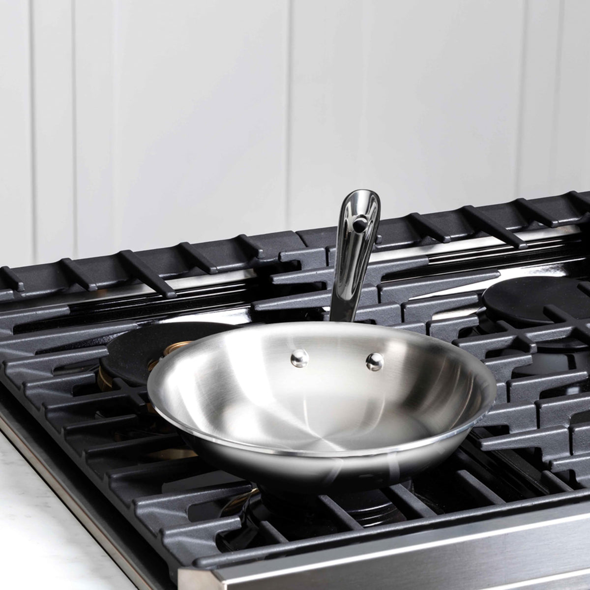 All-Clad D3 stainless tri-ply core delivers fast, even heat.
