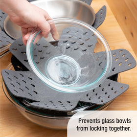 All-Clad dish drying mat absorbs water quickly for a tidy kitchen counter.