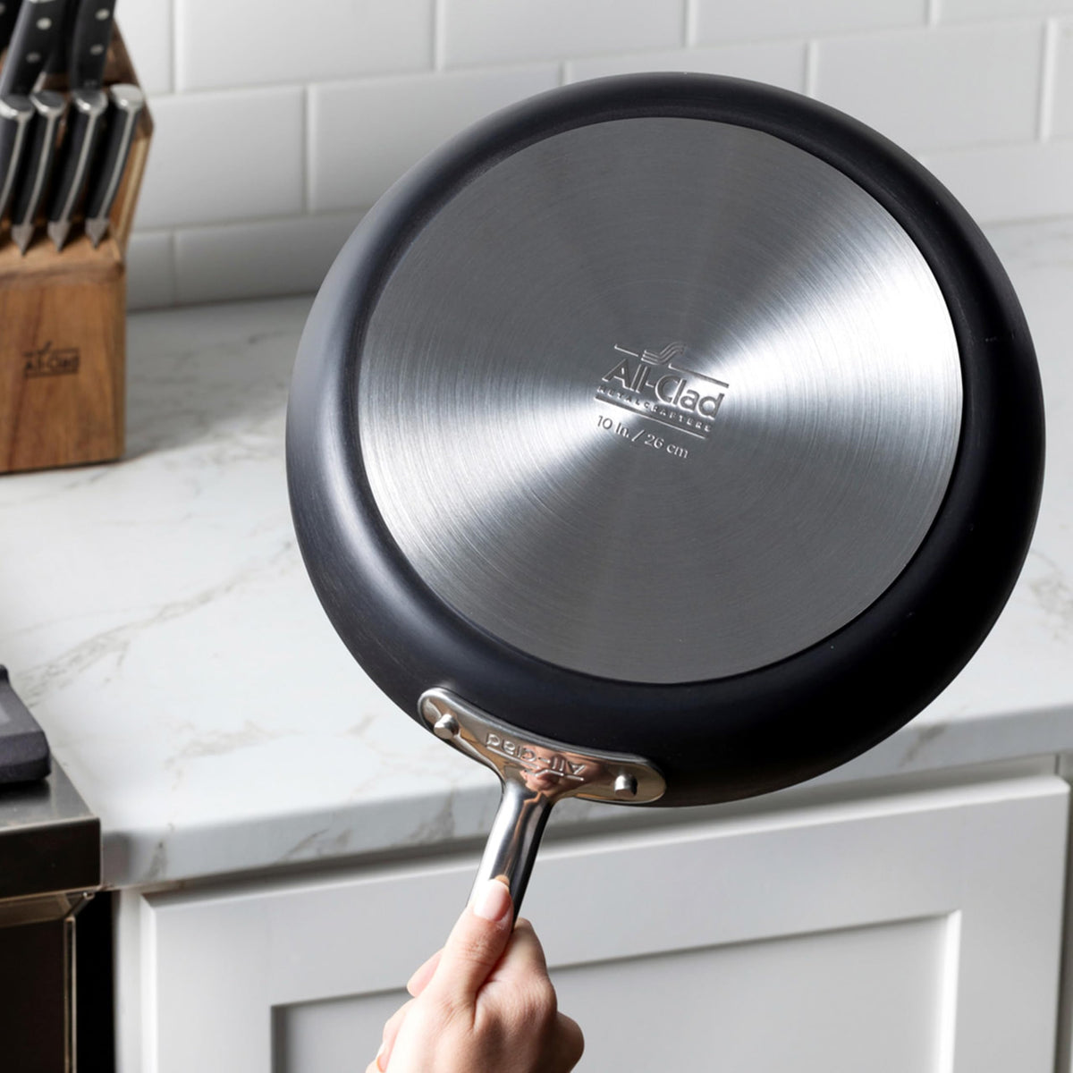 All-Clad HA1 Expert dishwasher safe pan for effortless cleanup.