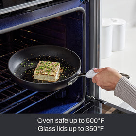 All-Clad HA1 Expert stainless-steel handle for secure grip during cooking.