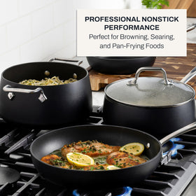 All-Clad HA1 induction-compatible base enables universal stovetop use.