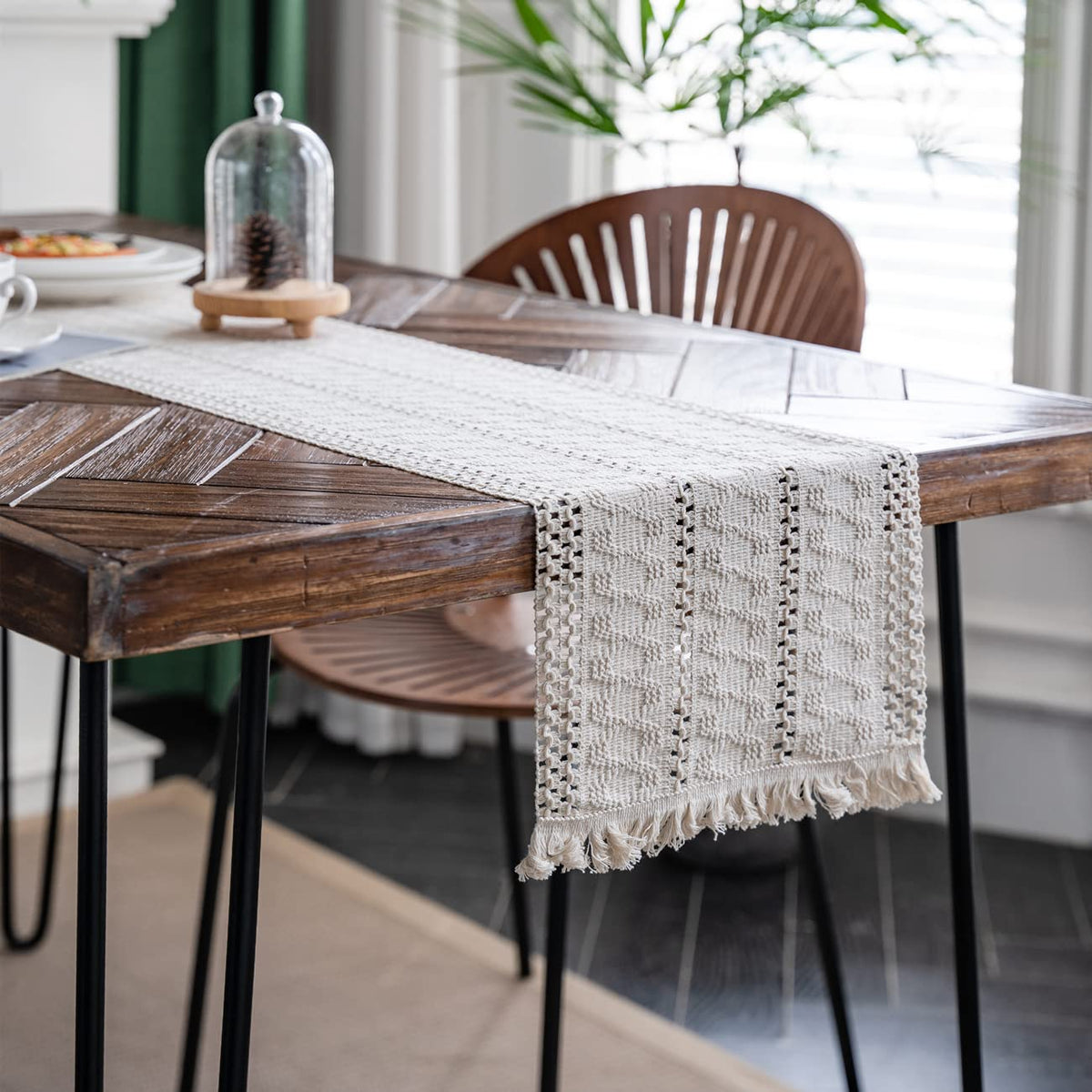 Alynsehom macrame runner on dining table creates inviting bohemian dining ambience.