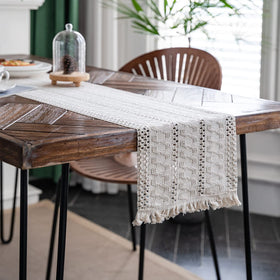 Alynsehom macrame runner on dining table creates inviting bohemian dining ambience.