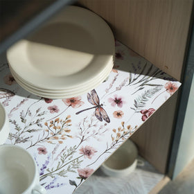 Amiitay Floral Shelf Liner waterproof surface resists spills.