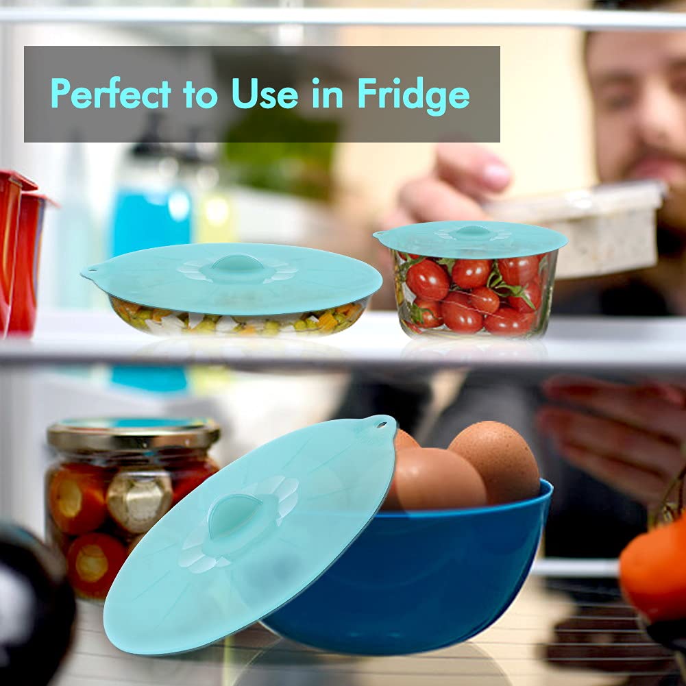 Andyken suction silicone lid prevents spills on cups and bowls.