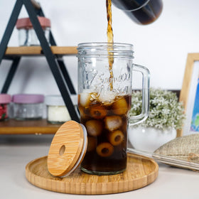 ANOTION portable tumbler with handle fits most car cup holders.