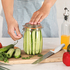 Anwoi 32oz jars with hinged lids store spices, jams, or snacks neatly.