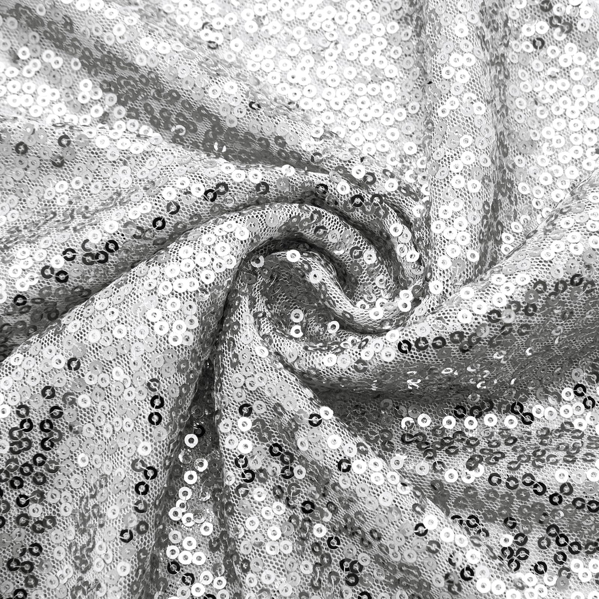 Aormenzy table runner combines durable polyester with dense sequins for longevity.