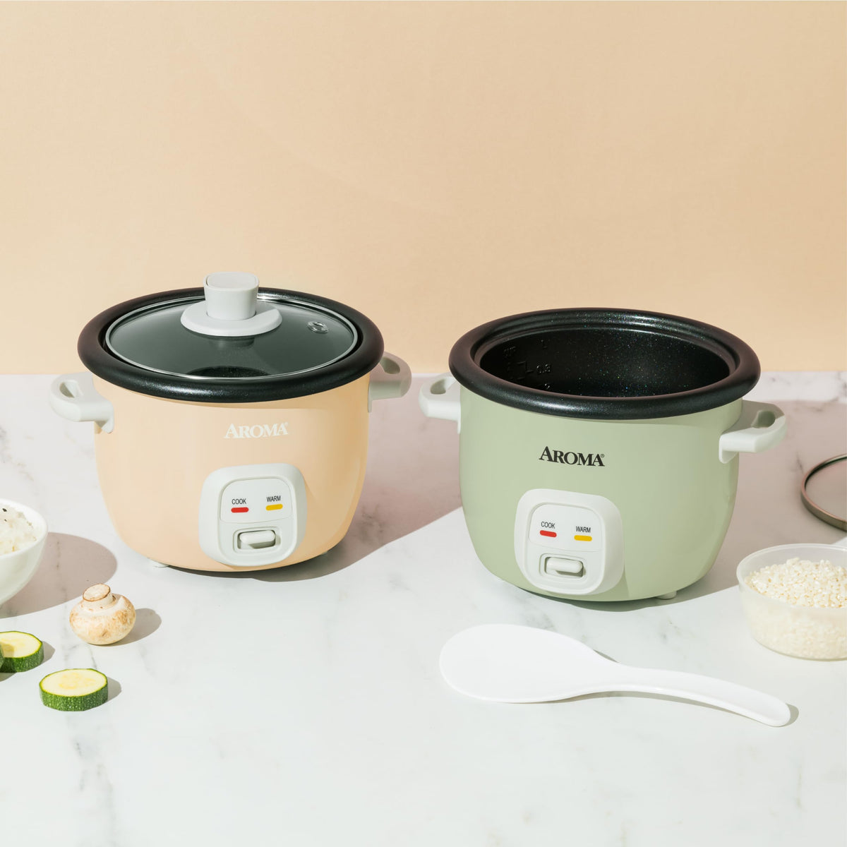 AROMA Mini Rice Cooker accessories include measuring cup and spatula for easy prep
