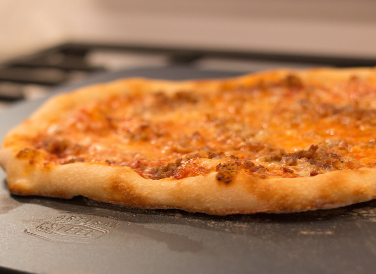 Artisan Steel pizza steel in oven demonstrates heat transfer for crisp crust