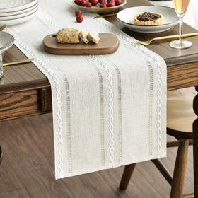 Artoid Mode beige rustic table runner with embroidered hollow design for festive dining.