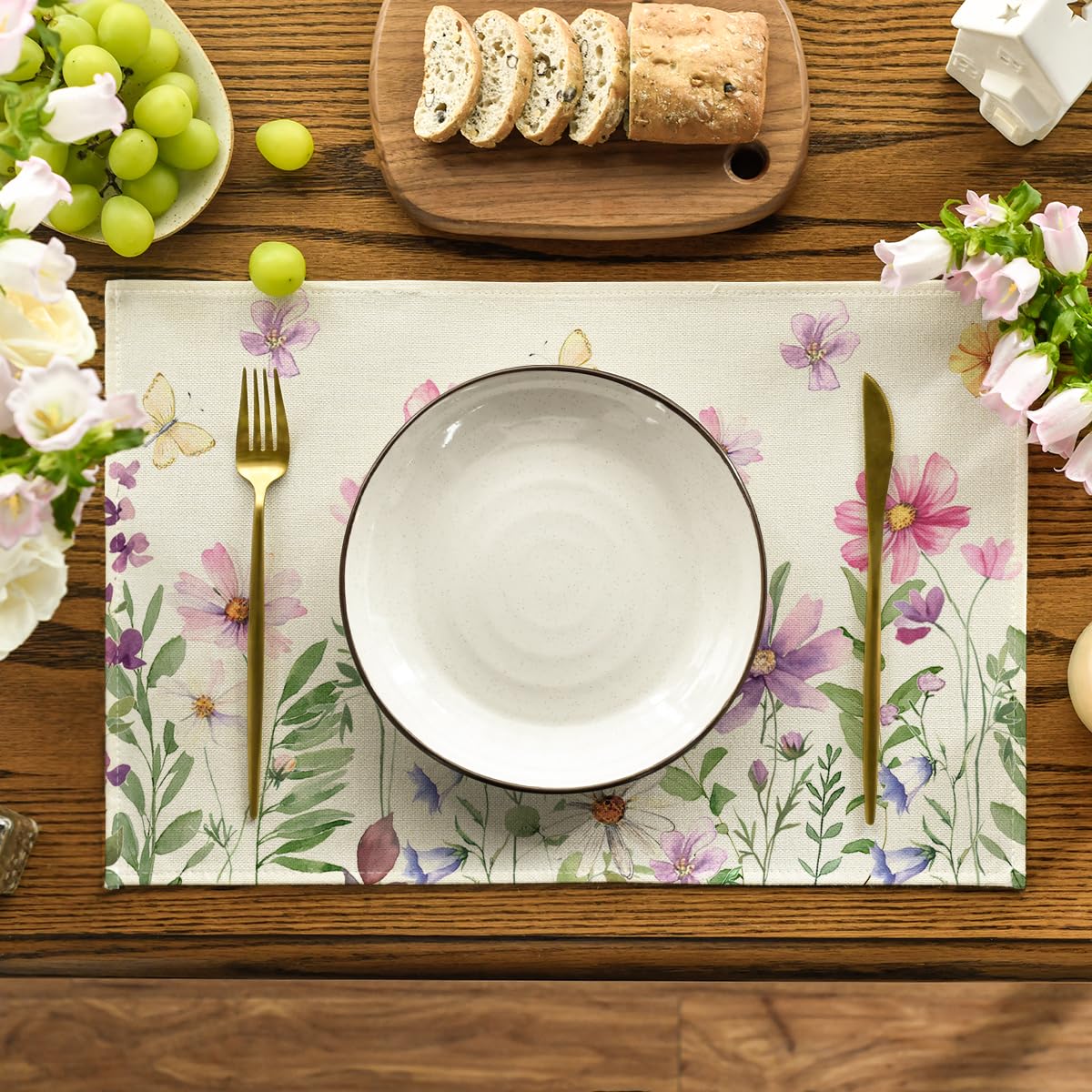 Artoid Mode Floral Butterfly placemats protect surfaces from spills during meals.