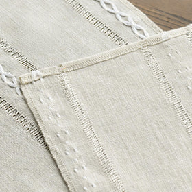 Artoid Mode machine-washable table runner cleans easily while preserving color.