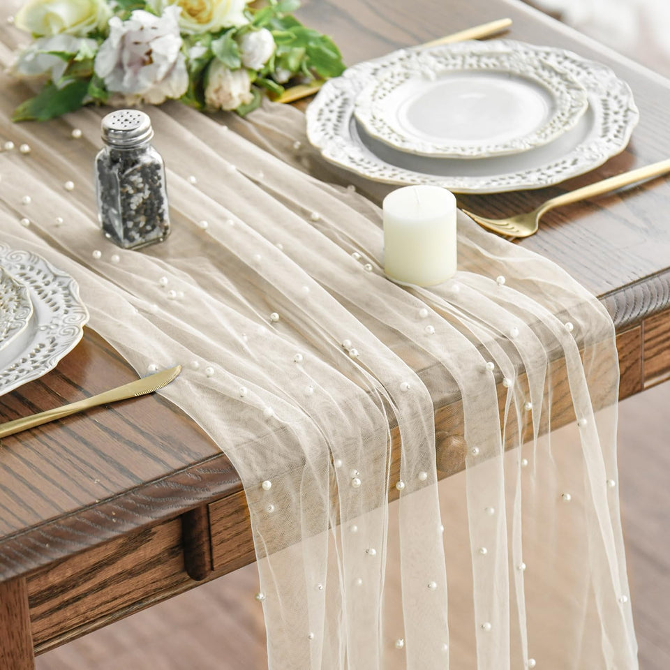 Artoid Mode pearl beige gauze table runner 120-inch enhances holiday dining decor.