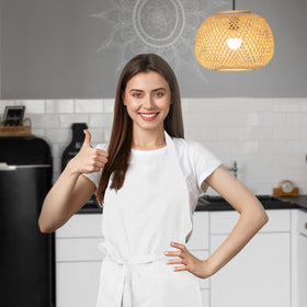Avalon Kitchen white apron fabric ready for dishwashing and easy cleanup after cooking.