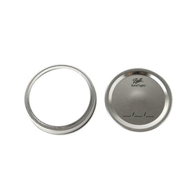 Ball mason jar with airtight lids ideal for food storage and preserves.