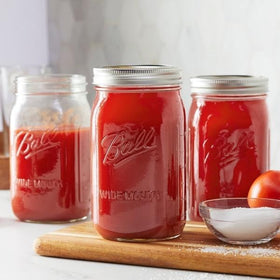 Ball jars with secure lids for pantry storage and gifting.