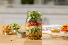 Ball Mason Jar lid and band included for secure sealing