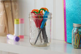 Ball jar filled with preserves, ideal for gifting or pantry organization.