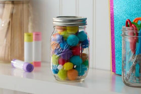 Ball mason jars shown as gifts and craft projects for DIY favors.
