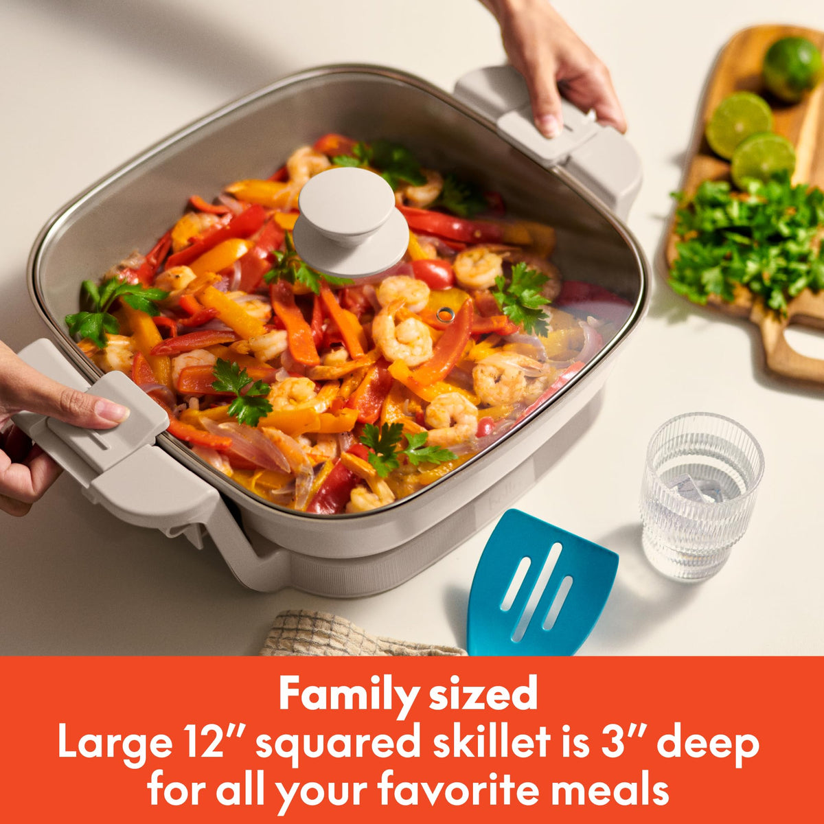 BELLA Make & Take electric skillet with lid open shows the large 12-inch cooking surface.