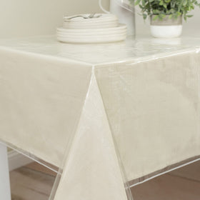 Benson Mills durable vinyl tablecloth maintains a sleek transparent look.
