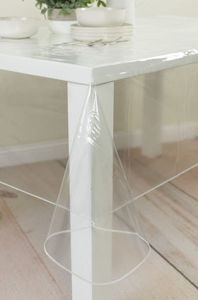Benson Mills tablecloth on long table during a lively gathering.