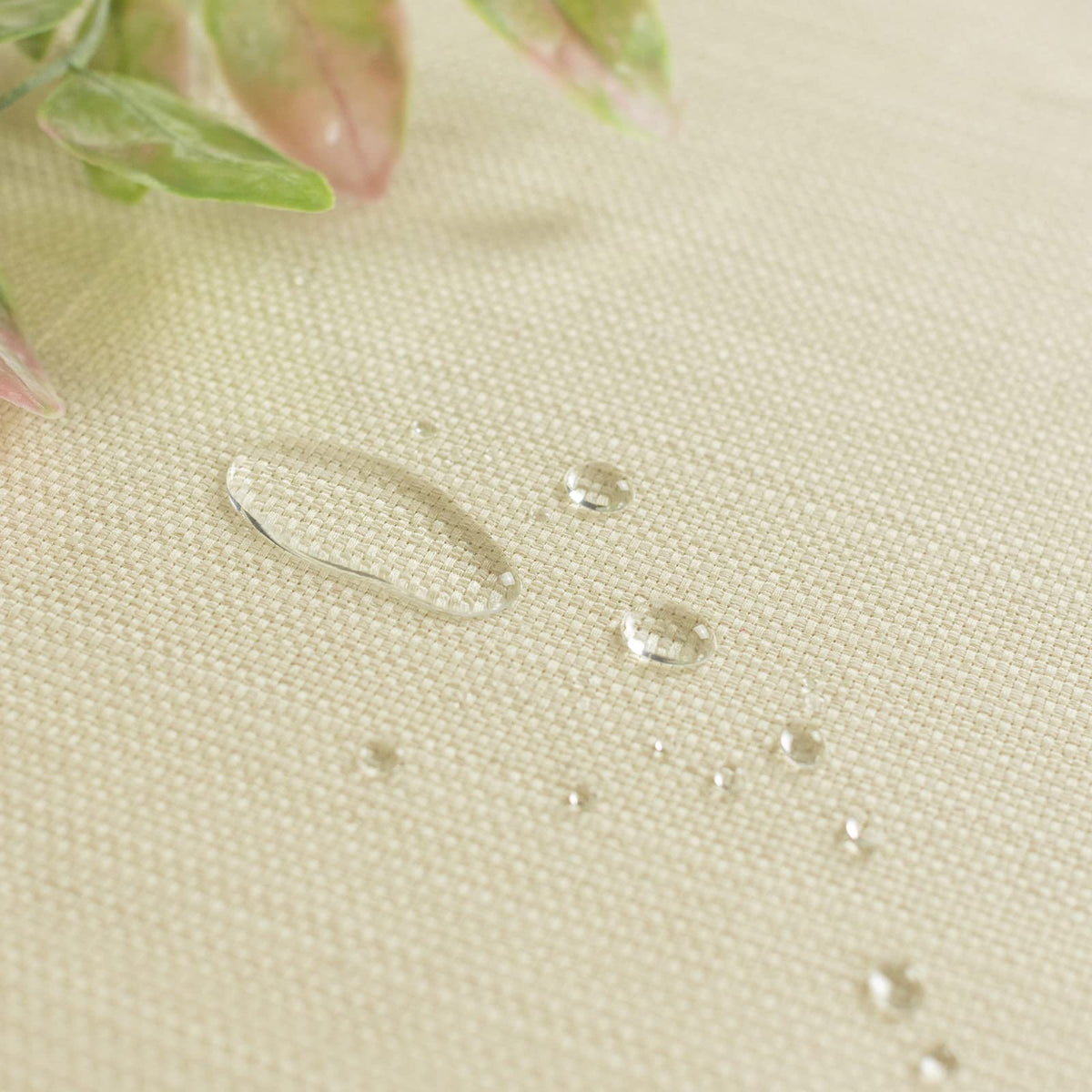 Benson Mills waterproof tablecloth for 60x84, protects surfaces while preserving wood grain.