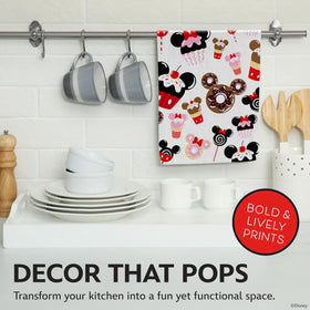 Towels drying dishes and wiping counters in a busy Disney-themed kitchen scene.