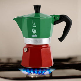 Bialetti Moka Express Italia red-on-stovetop pot brewing quick cups of real Italian coffee