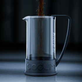 Bodum Brazil 34oz French Press red handle closeup showcases heat-safe grip for comfortable pouring.