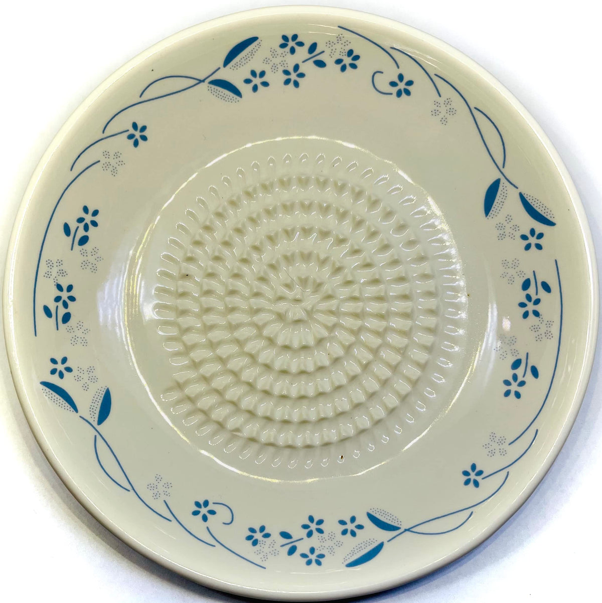 Closeup of the BonCera design highlighting the flower motif