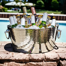 BREKX insulated double-walled beverage tub preserves ice for hours at outdoor parties.