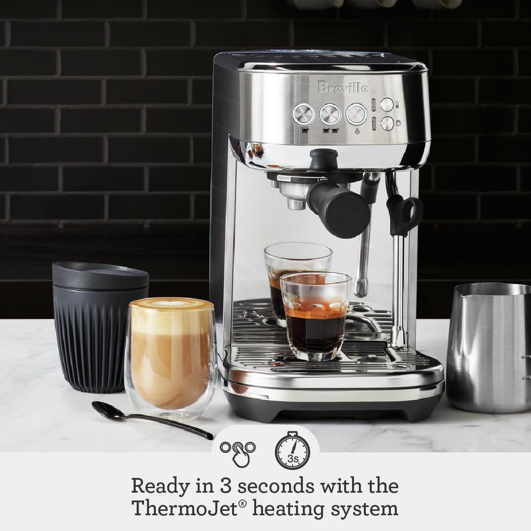 Breville Bambino Plus milk texturing wand demonstrates automatic microfoam