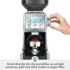 Breville BCG820DBL ground into an airtight container shows versatile storage.