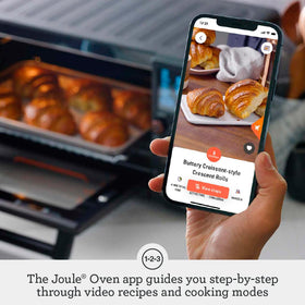 Breville BOV950BST oven cavity view reveals spacious interior for family batches.