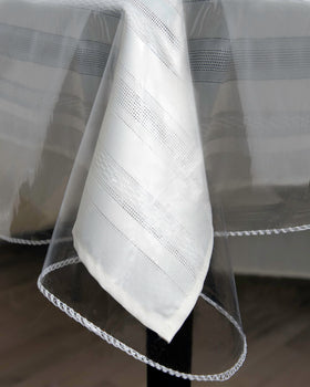 Broder MFG heavy-duty clear table cover 52x70 protects surfaces during meals.