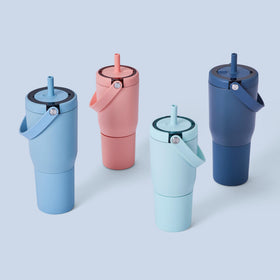 Resa tumbler resting in a cup holder for travel-ready use