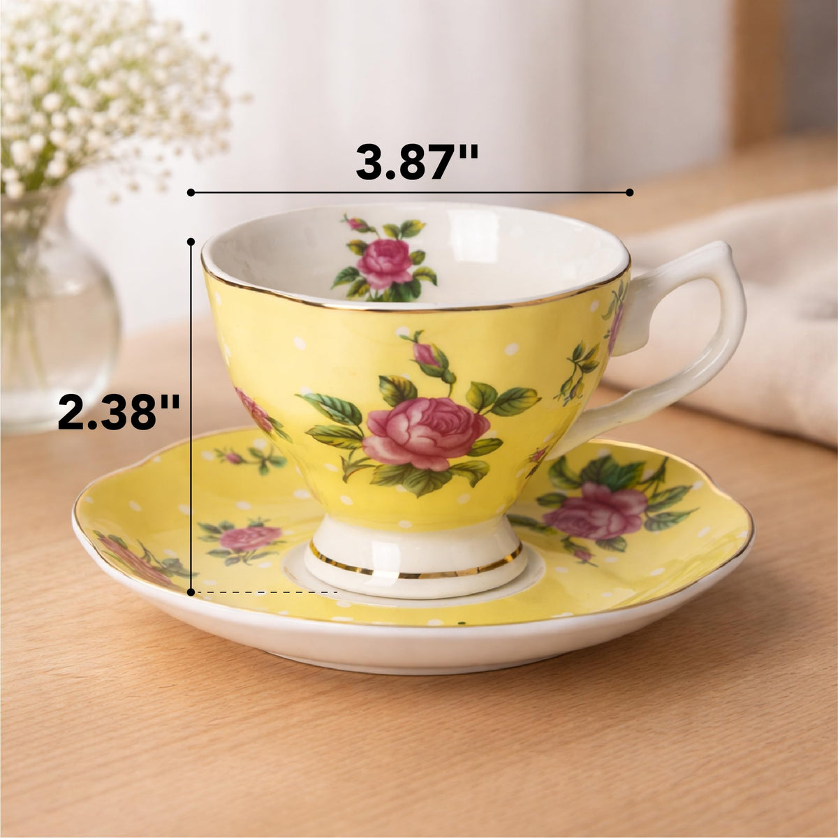 BTaT blue floral tea cup close-up, gold trim adds vintage sophistication.