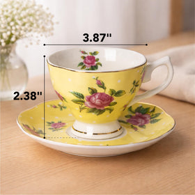 BTaT blue floral tea cup close-up, gold trim adds vintage sophistication.
