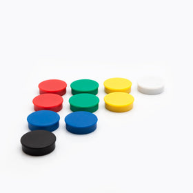 Bullseye Office 1-inch magnet holding papers to a board for classroom use.