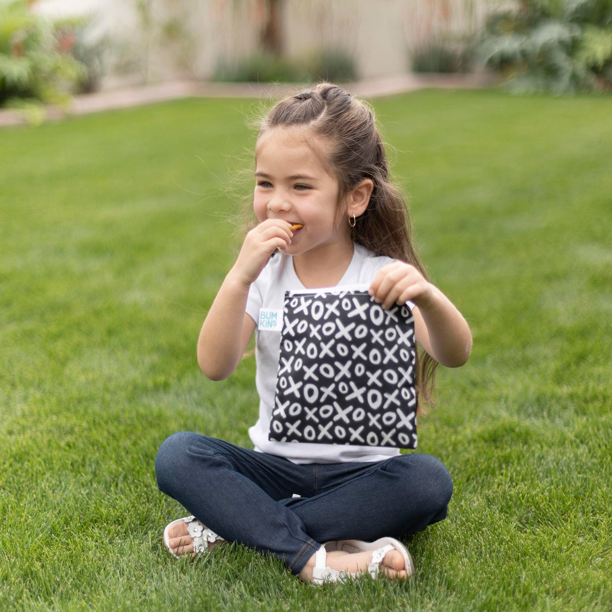 Bumkins waterproof fabric texture resists moisture in daily carry.