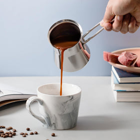 Caizen Coffee decorative traditional design doubles as a kitchen centerpiece.