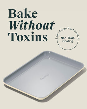 Caraway 9x13-inch cream baking sheet ideal for compact batches and even heating.