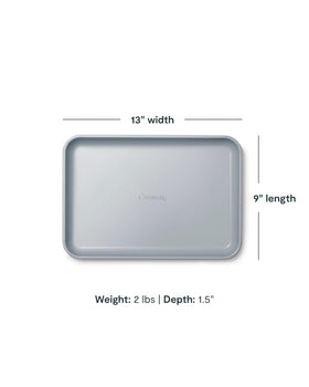 Caraway oven-safe sheet pan with aluminized steel core for even heat distribution.