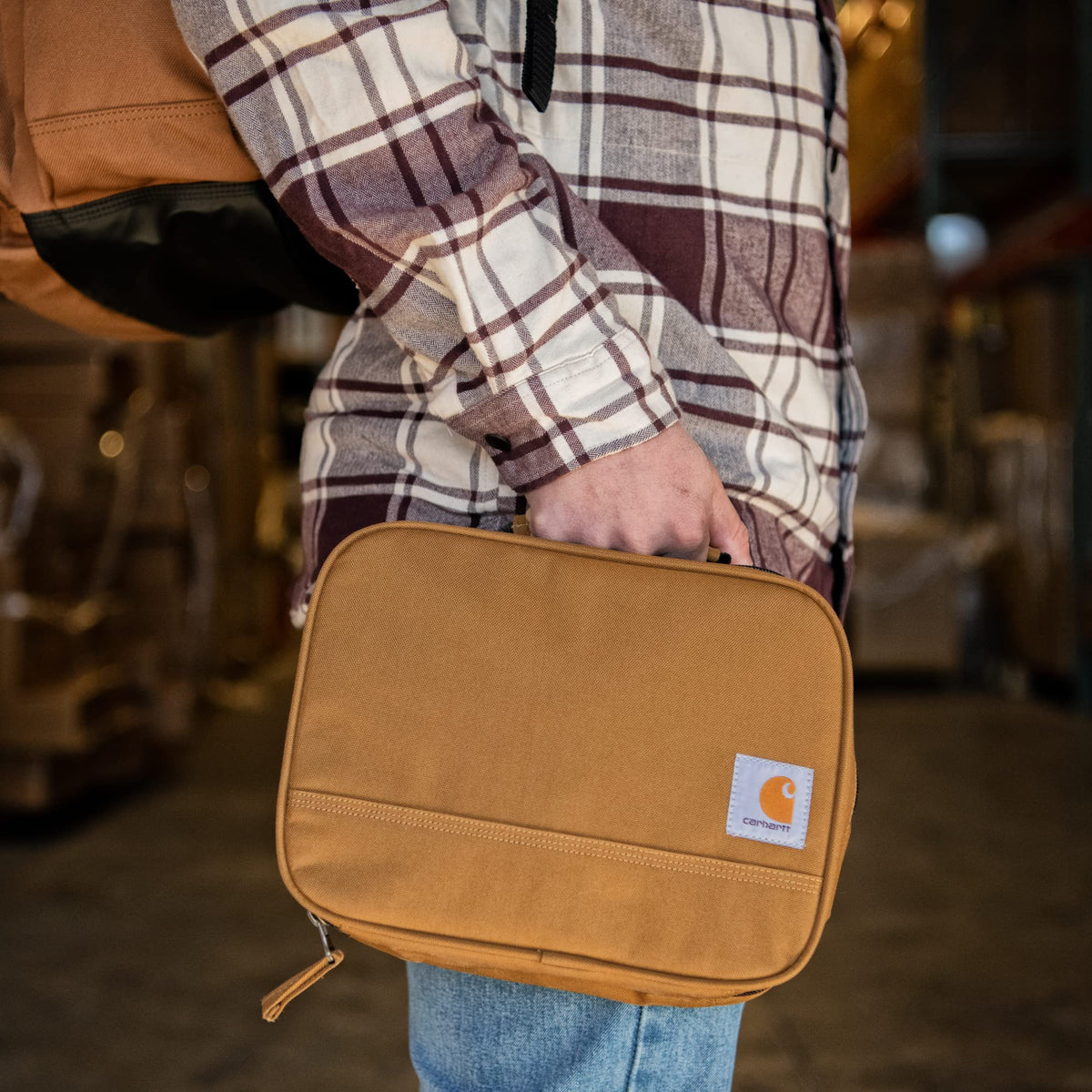 Carhartt insulated lunch box contents four cans with easy-access opening.
